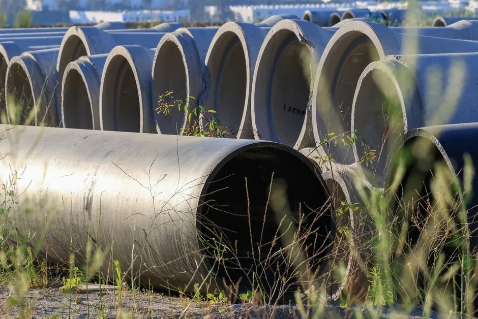 Stacked concrete pipes ready for installation